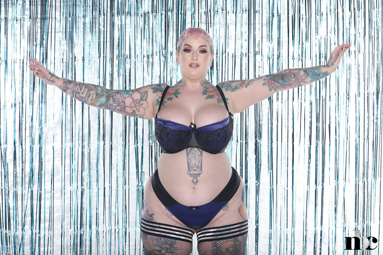 Pink haired BBW Cherrie Pie strips & exposes her monster tits and inked booty  